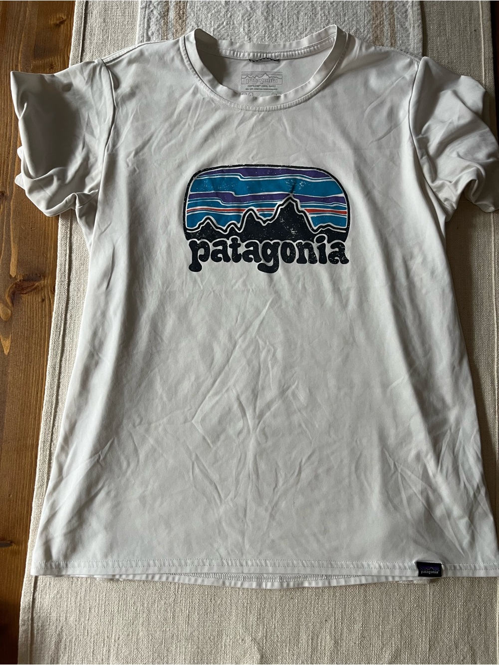 Patagonia White Casual Graphic Button-Style Shirt with Blue & Purple Logo